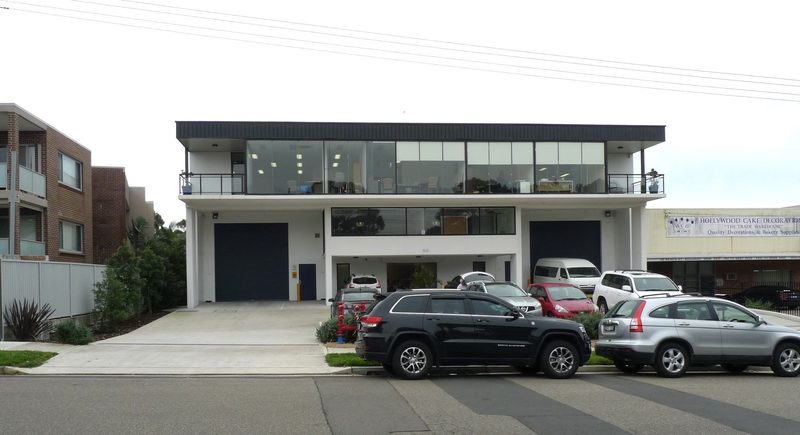 Two-storey office and warehouse units raised above flood level, Beach Street