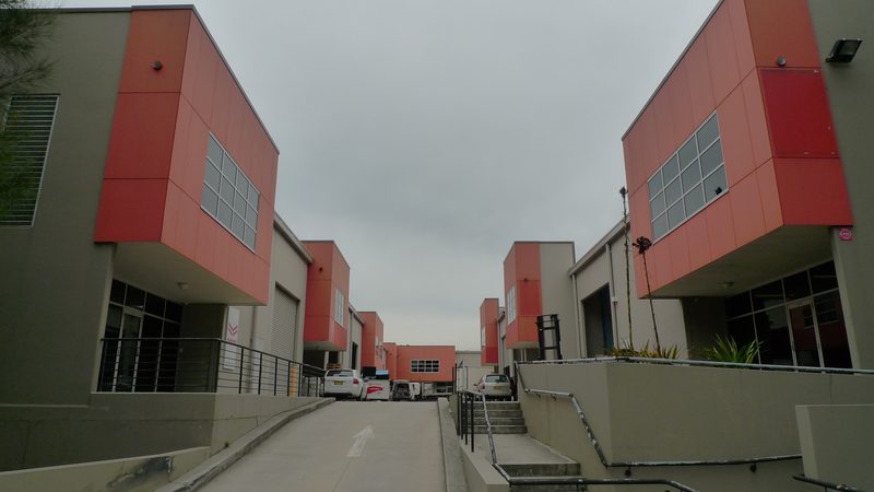 Interior approach from McPherson Street. Site level is raised as it is a flood vale zone. This allows for water to move over, and through the site.