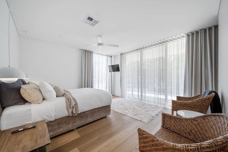 Master bedroom with ensuite and generous robe opens onto the north facing balcony