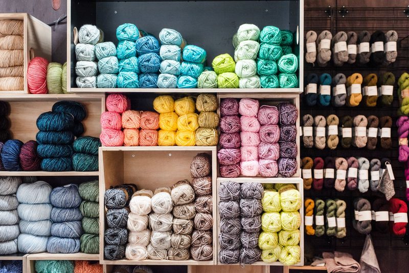 Modular timber shelving detail in a yarn shop, Skein Sisters