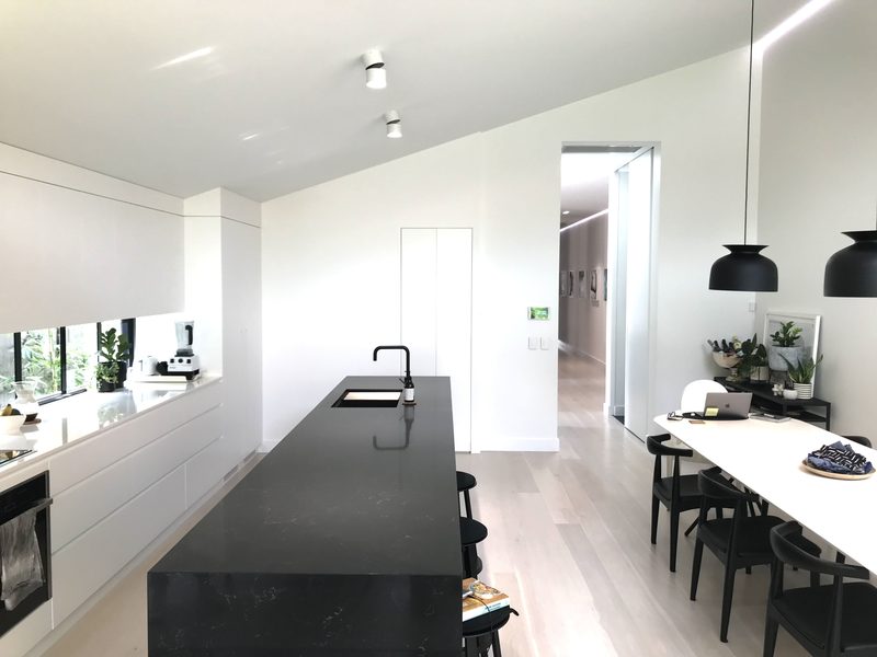 The new section of the house is linked with the rest of the cottage via a corridor, which also houses the main bathroom and a powder room on the opposite side of the hallway