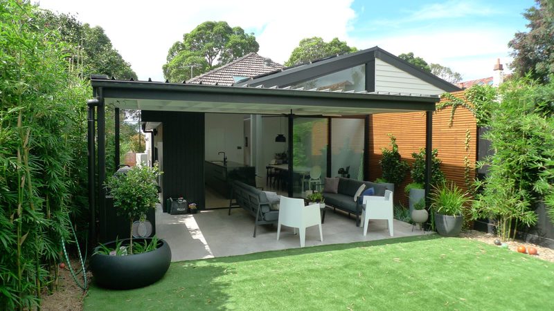 Contemporary black rear extension opening fully to the garden, Summer Hill