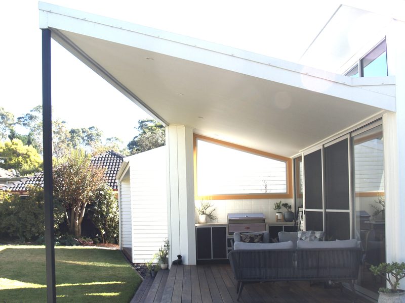 The new covered outdoor room at the back, opening to the garden